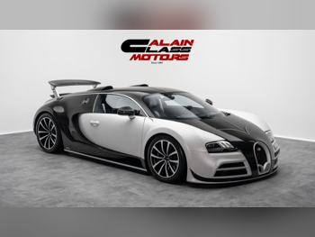 Bugatti  Veyron  2006  Automatic  5,386 Km  12 Cylinder  All Wheel Drive (AWD)  Coupe / Sport  Black and Silver