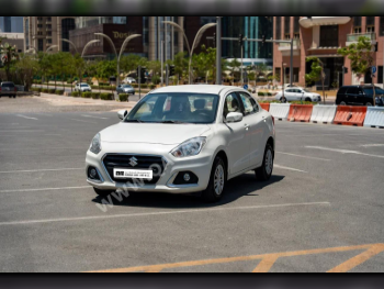 Suzuki  Dzire  2024  Automatic  44,700 Km  4 Cylinder  Front Wheel Drive (FWD)  Sedan  White  With Warranty