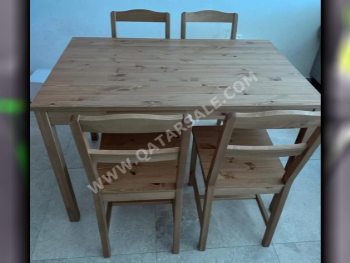 طاولة طعام مع كراسي  - بنى