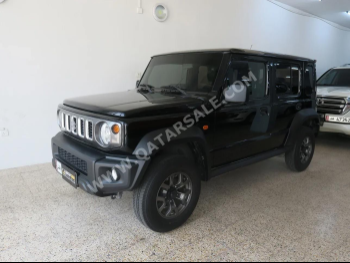 سوزوكي  جمني  2024  اوتوماتيك  14,000 كم  4 سلندر  دفع رباعي  اس يو في  أسود  تحت الضمان