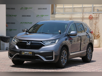 هوندا  سي آر في  تورينغ  2022  اوتوماتيك  55,000 كم  4 سلندر  دفع رباعي  اس يو في  رمادي