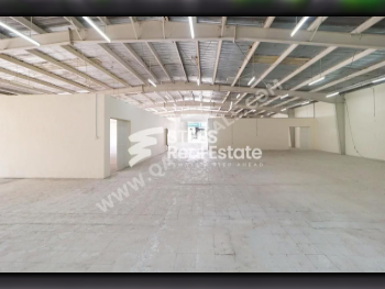مخازن و مستودعات - الريان  - المنطقة الصناعية  -المساحة: 1800 متر مربع
