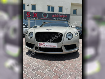 Bentley  Continental  GT  2015  Automatic  125,000 Km  12 Cylinder  All Wheel Drive (AWD)  Coupe / Sport  Gold