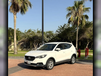 ام جي  زد اس  2020  اوتوماتيك  77,200 كم  4 سلندر  سحب امامي  اس يو في  أبيض