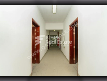 مخازن و مستودعات - الريان  - المنطقة الصناعية  -المساحة: 2000 متر مربع