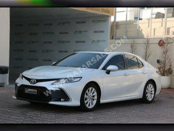 Toyota  Camry  GLE  2023  Automatic  90,000 Km  4 Cylinder  Front Wheel Drive (FWD)  Sedan  White  With Warranty