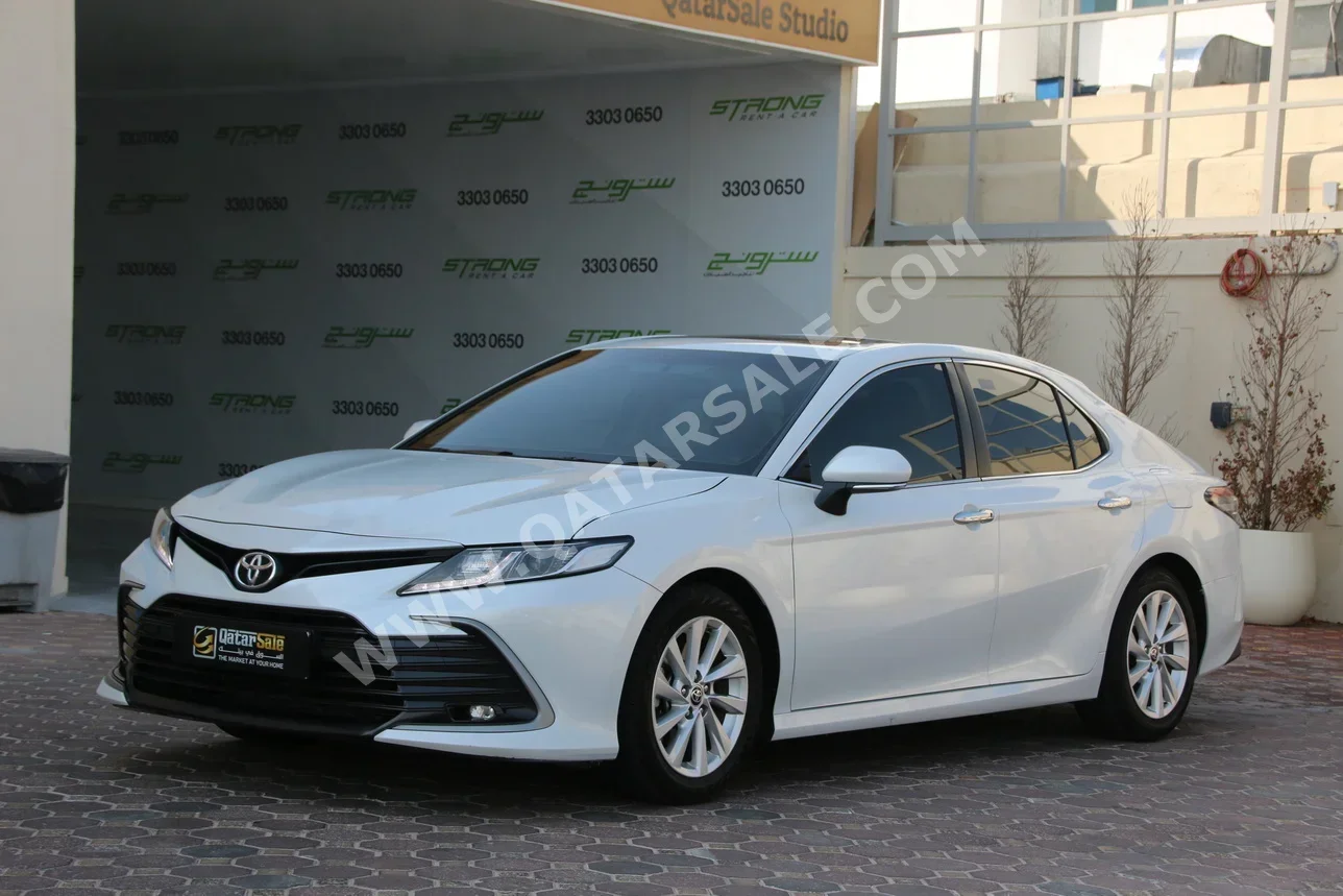 Toyota  Camry  GLE  2023  Automatic  90,000 Km  4 Cylinder  Front Wheel Drive (FWD)  Sedan  White  With Warranty