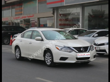 Nissan  Altima  2.5 S  2017  Automatic  103,000 Km  4 Cylinder  Front Wheel Drive (FWD)  Sedan  White