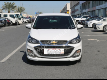 Chevrolet  Spark  2019  Automatic  148,000 Km  4 Cylinder  Front Wheel Drive (FWD)  Hatchback  White