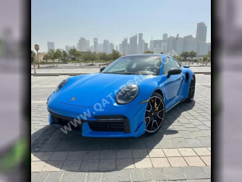 بورش  911  توربو اس  2023  اوتوماتيك  11,000 كم  8 سلندر  دفع خلفي  كوبيه \ سبورت  ازرق  تحت الضمان