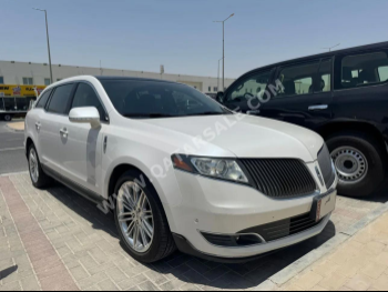 Lincoln  MKT  2015  Automatic  118,000 Km  4 Cylinder  Rear Wheel Drive (RWD)  SUV  White