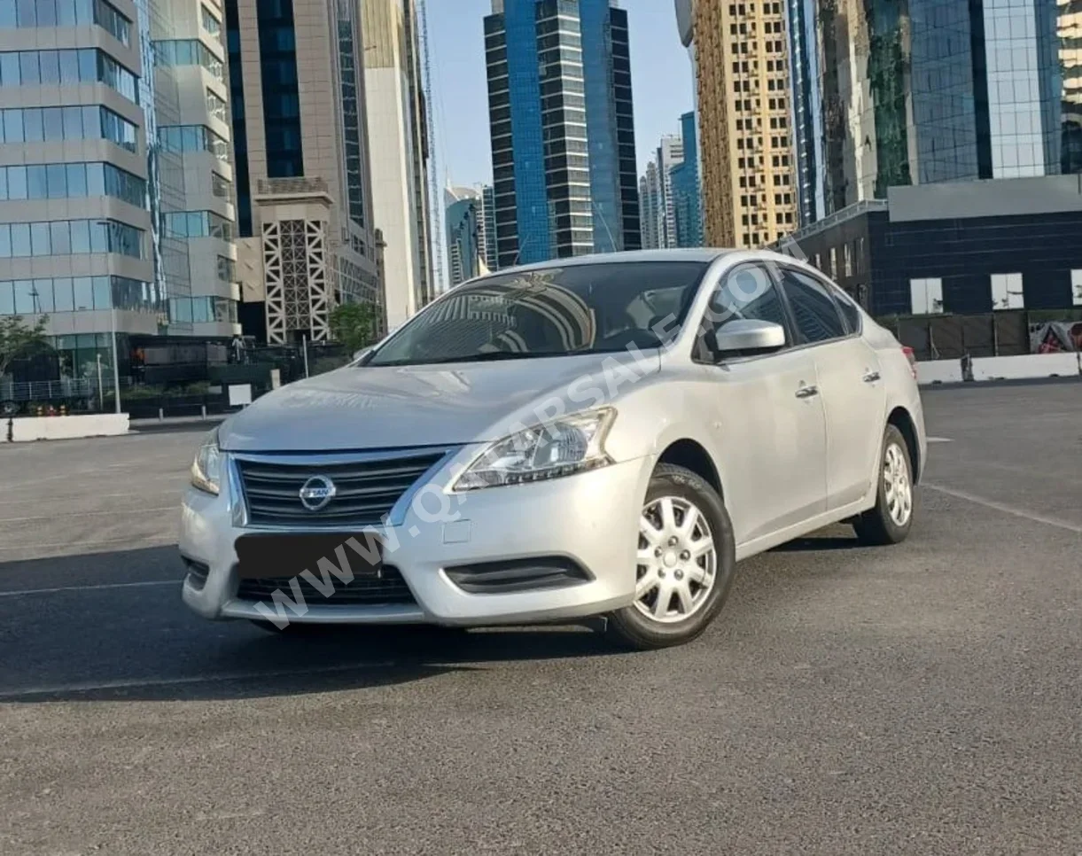 Nissan  Sentra  2014  Automatic  183,410 Km  4 Cylinder  Front Wheel Drive (FWD)  Sedan  White