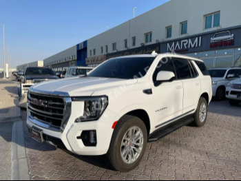 GMC  Yukon  SLT  2022  Automatic  25,000 Km  8 Cylinder  Four Wheel Drive (4WD)  SUV  White  With Warranty