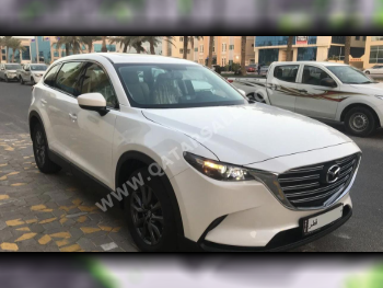 مازدا  سي اكس 9  4 سلندر  إس يو في 4 في 4  أبيض  2023