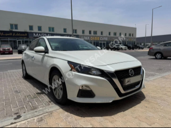 Nissan  Altima  2022  Automatic  33,000 Km  4 Cylinder  Front Wheel Drive (FWD)  Sedan  White