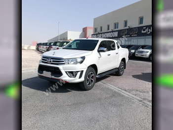 Toyota  Hilux  SR5  2018  Automatic  173,000 Km  4 Cylinder  Four Wheel Drive (4WD)  Pick Up  White