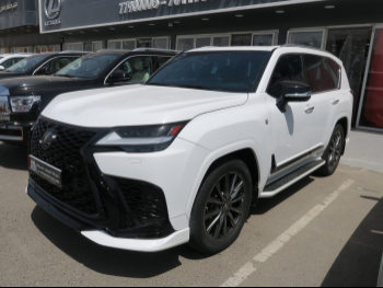 Lexus  LX  600 F Sport  2022  Automatic  69,000 Km  6 Cylinder  Four Wheel Drive (4WD)  SUV  White  With Warranty
