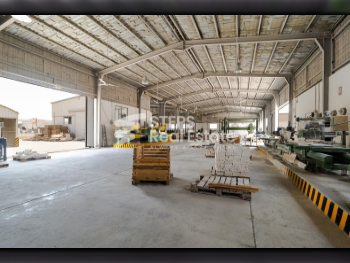 مخازن و مستودعات - الريان  - المنطقة الصناعية  -المساحة: 6000 متر مربع