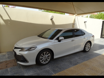 Toyota  Camry  GLE  2021  Automatic  6,000 Km  4 Cylinder  Front Wheel Drive (FWD)  Sedan  White  With Warranty
