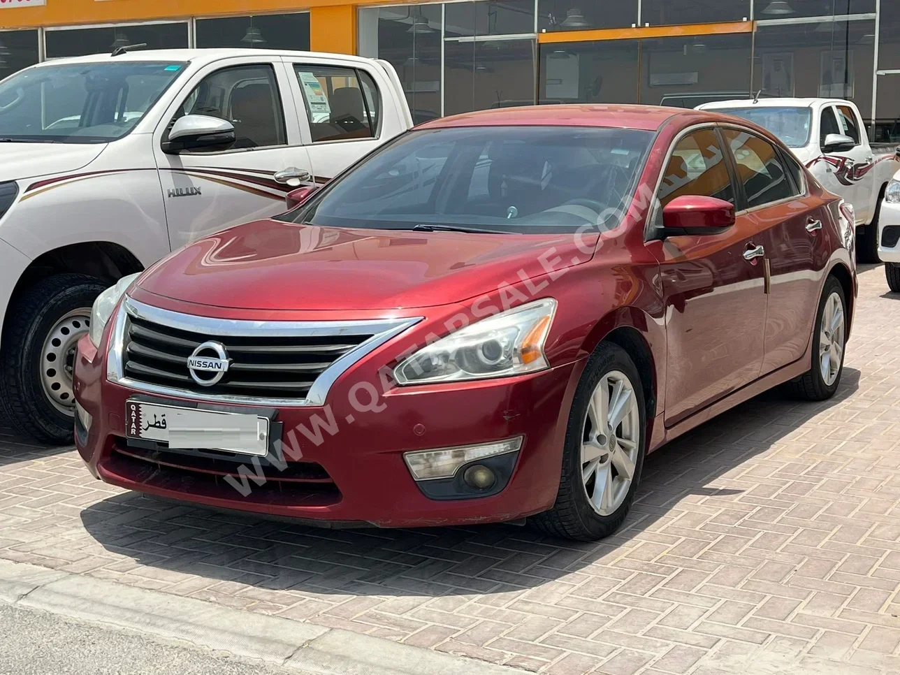 Nissan  Altima  2.5 SV  2013  Automatic  174,000 Km  4 Cylinder  Rear Wheel Drive (RWD)  Sedan  Red