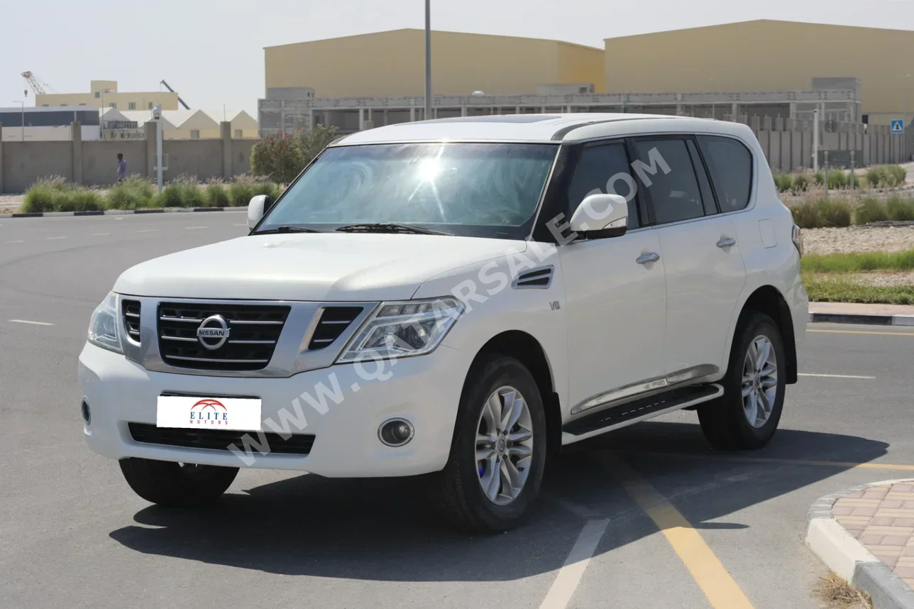 نيسان  باترول  ال اي  2013  اوتوماتيك  249,000 كم  8 سلندر  دفع رباعي  اس يو في  أبيض