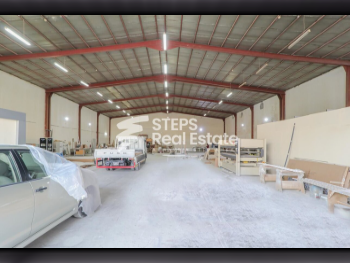 مخازن و مستودعات - الريان  - المنطقة الصناعية  -المساحة: 1000 متر مربع