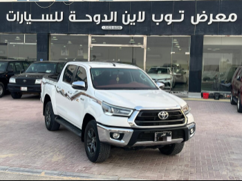 Toyota  Hilux  SR5  2024  Automatic  51,000 Km  4 Cylinder  Four Wheel Drive (4WD)  Pick Up  White  With Warranty