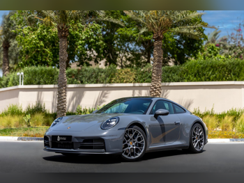 Porsche  911  Carrera  2025  Automatic  12,000 Km  6 Cylinder  Rear Wheel Drive (RWD)  Coupe / Sport  Silver  With Warranty