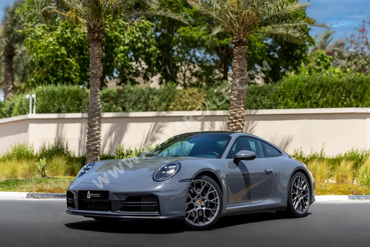 Porsche  911  Carrera  2025  Automatic  12,000 Km  6 Cylinder  Rear Wheel Drive (RWD)  Coupe / Sport  Silver  With Warranty