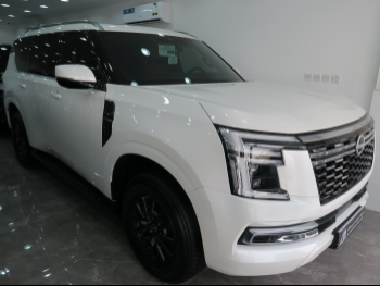 Nissan  Patrol  Titanium  2025  Automatic  4,000 Km  6 Cylinder  Four Wheel Drive (4WD)  SUV  White  With Warranty