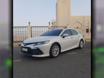 Toyota  Camry  GLE  2023  Automatic  12,000 Km  4 Cylinder  Front Wheel Drive (FWD)  Sedan  White  With Warranty