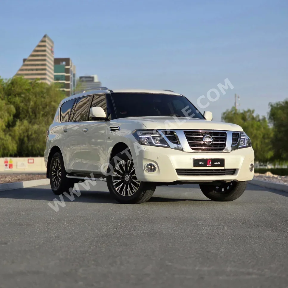 نيسان  باترول  ال اي  2014  اوتوماتيك  202,000 كم  8 سلندر  دفع رباعي  اس يو في  أبيض