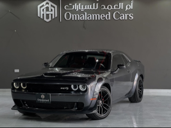 Dodge  Challenger  SXT Plus  2021  Automatic  84,000 Km  6 Cylinder  Rear Wheel Drive (RWD)  Coupe / Sport  Gray