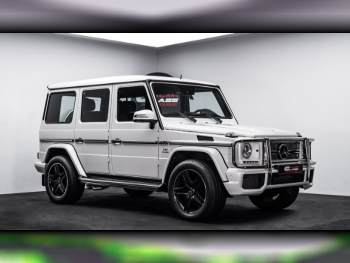 Mercedes-Benz  G-Class  65 AMG  2014  Automatic  30,828 Km  12 Cylinder  Four Wheel Drive (4WD)  SUV  White