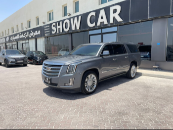 Cadillac  Escalade  Platinum  2018  Automatic  167,000 Km  8 Cylinder  Four Wheel Drive (4WD)  SUV  Gray