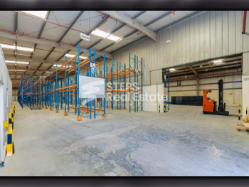 مخازن و مستودعات - الريان  - المنطقة الصناعية  -المساحة: 2500 متر مربع