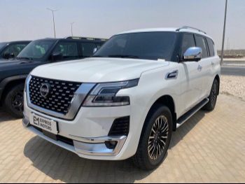Nissan  Patrol  Platinum  2023  Automatic  18,000 Km  6 Cylinder  Four Wheel Drive (4WD)  SUV  White  With Warranty