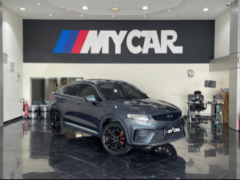 جيلي  توجيلا  2023  اوتوماتيك  32,000 كم  4 سلندر  دفع رباعي  اس يو في  رمادي  تحت الضمان