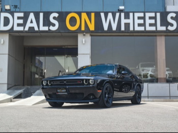 Dodge  Challenger  R/T  2016  Automatic  42,000 Km  8 Cylinder  Rear Wheel Drive (RWD)  Coupe / Sport  Black