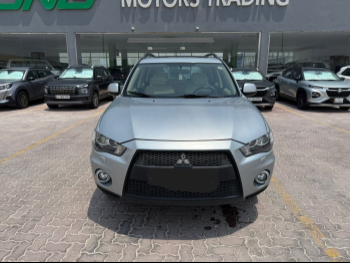 Mitsubishi  Outlander  2013  Automatic  175,000 Km  4 Cylinder  Four Wheel Drive (4WD)  SUV  Silver