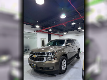 Chevrolet  Suburban  2016  Automatic  186,000 Km  8 Cylinder  Four Wheel Drive (4WD)  SUV  Brown
