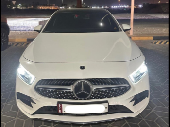 Mercedes-Benz  A-Class  200 AMG  2022  Automatic  28,000 Km  4 Cylinder  Front Wheel Drive (FWD)  Hatchback  White and Black  With Warranty