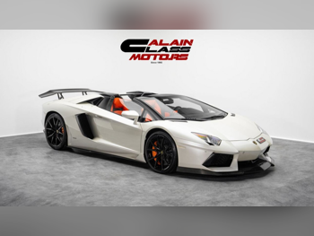 Lamborghini  Aventador  Roadster  2015  Automatic  23,460 Km  12 Cylinder  All Wheel Drive (AWD)  Convertible  White