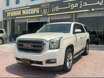 GMC  Yukon  SLT  2015  Automatic  130,000 Km  8 Cylinder  Four Wheel Drive (4WD)  SUV  White