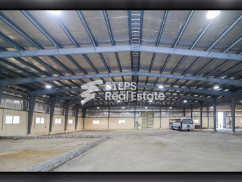 مخازن و مستودعات - الريان  - المنطقة الصناعية  -المساحة: 4000 متر مربع