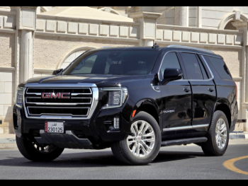 GMC  Yukon  SLT  2024  Automatic  48,000 Km  8 Cylinder  Four Wheel Drive (4WD)  SUV  Black  With Warranty