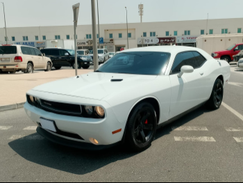 Dodge  Challenger  2013  Automatic  125,000 Km  6 Cylinder  Rear Wheel Drive (RWD)  Coupe / Sport  White