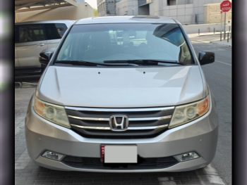 Honda  Odyssey  Touring  2012  Automatic  106,000 Km  6 Cylinder  Front Wheel Drive (FWD)  Van / Bus  Silver
