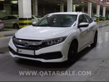 هوندا  سيفيك  4 سلندر  سيدان  أبيض  2021