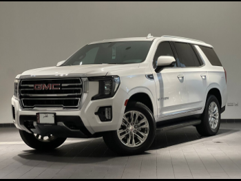 GMC  Yukon  SLT  2024  Automatic  19,900 Km  8 Cylinder  Four Wheel Drive (4WD)  SUV  White  With Warranty